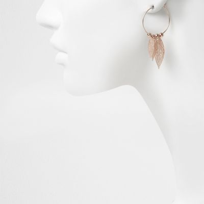 Rose gold tone hoop feather earrings